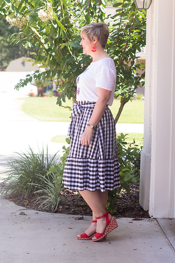 gingham skirt, red statement earrings, bright sandals, gingham