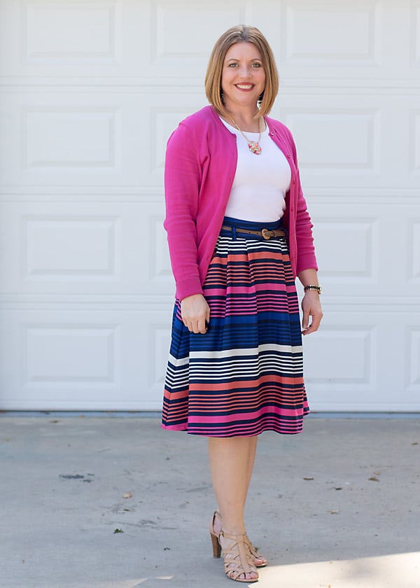 Hot pink cardigan with striped skirt, spring outfit