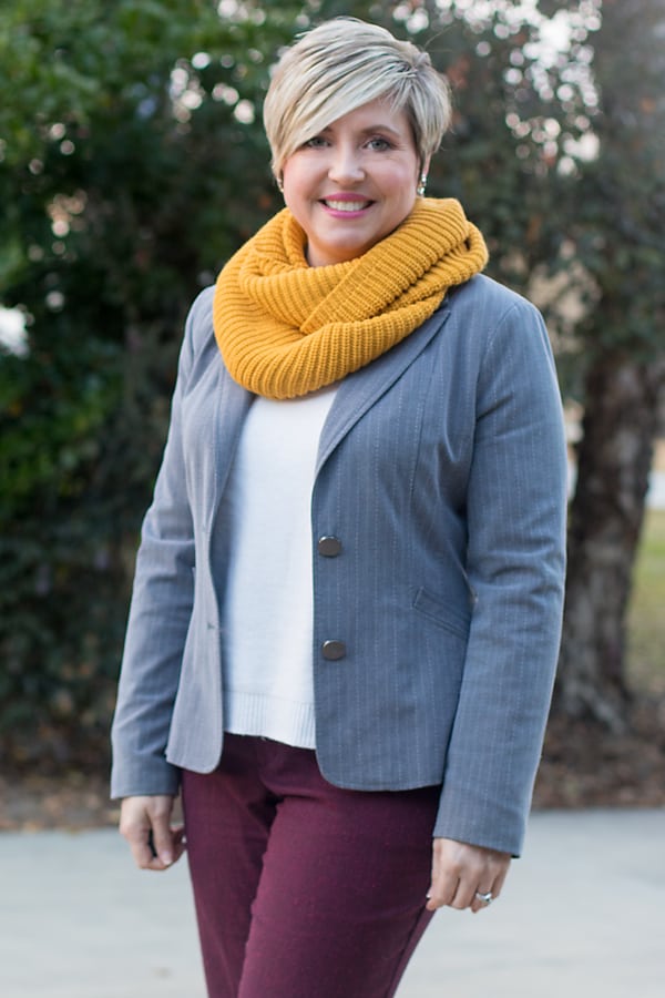 mustard infinity scarf with grey blazer