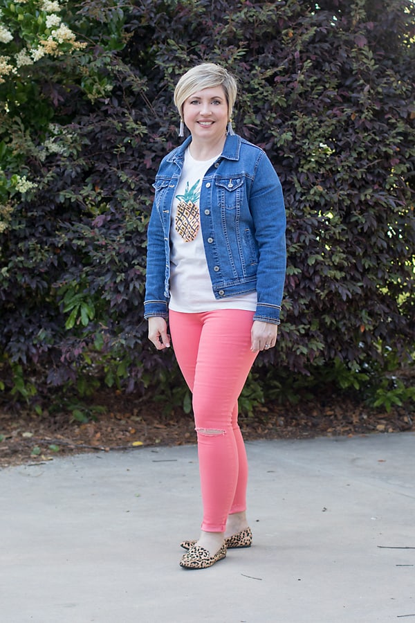 Denim jacket, graphic tee, coral jeans and leopard flats