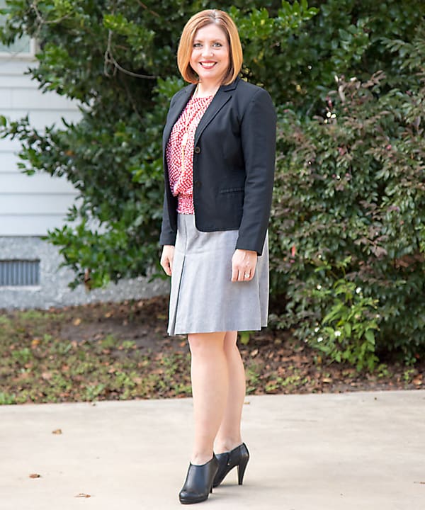 a line skirt with black cropped blazer