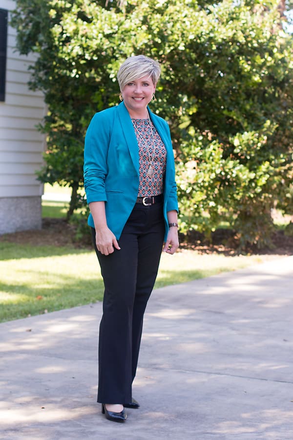 fall work wear with teal blazer and fall print top