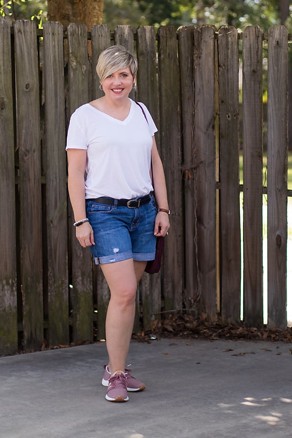 white v-neck t-shirt with denim shorts