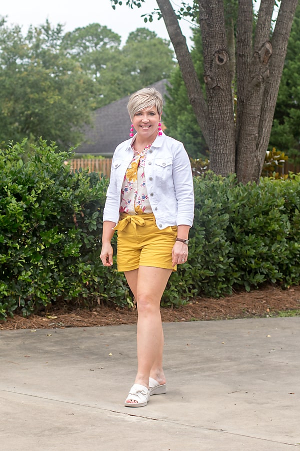 white denim jacket with bright shorts outfit over 40