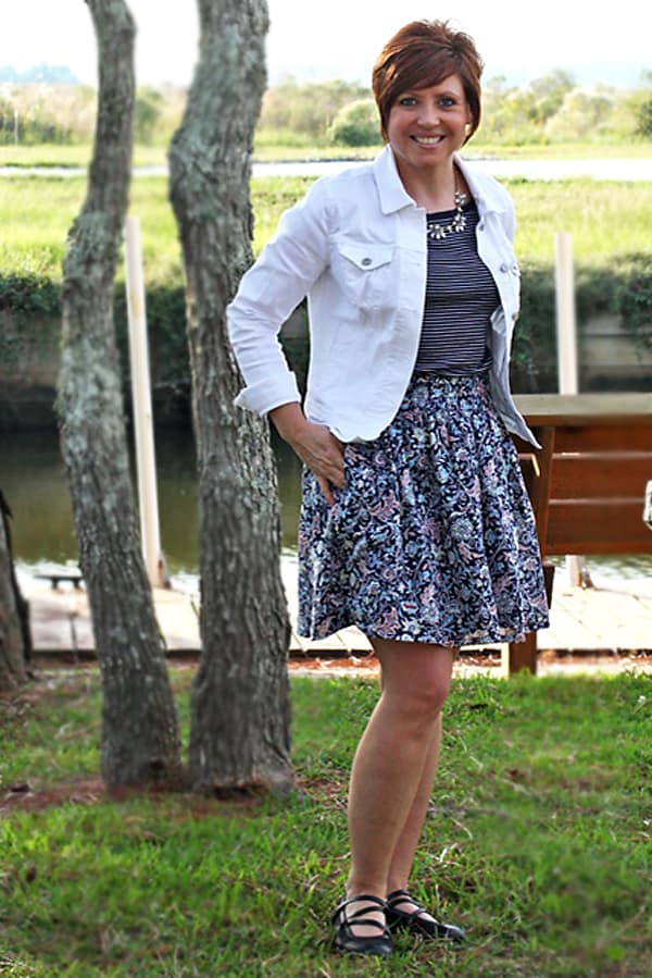 white denim jacket with floral skirt