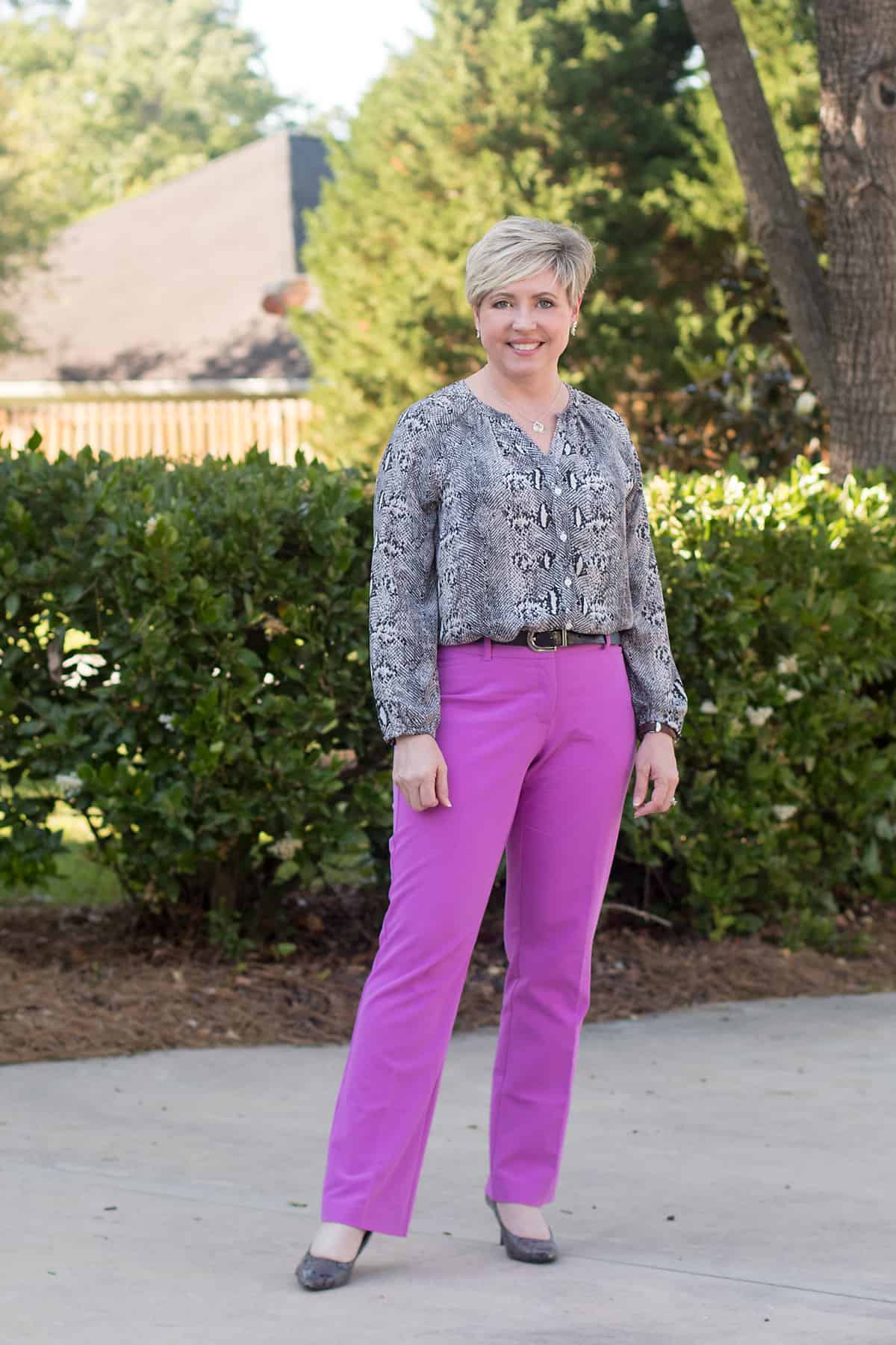 women's business casual look with amethyst orchid pants and snakeskin blouse