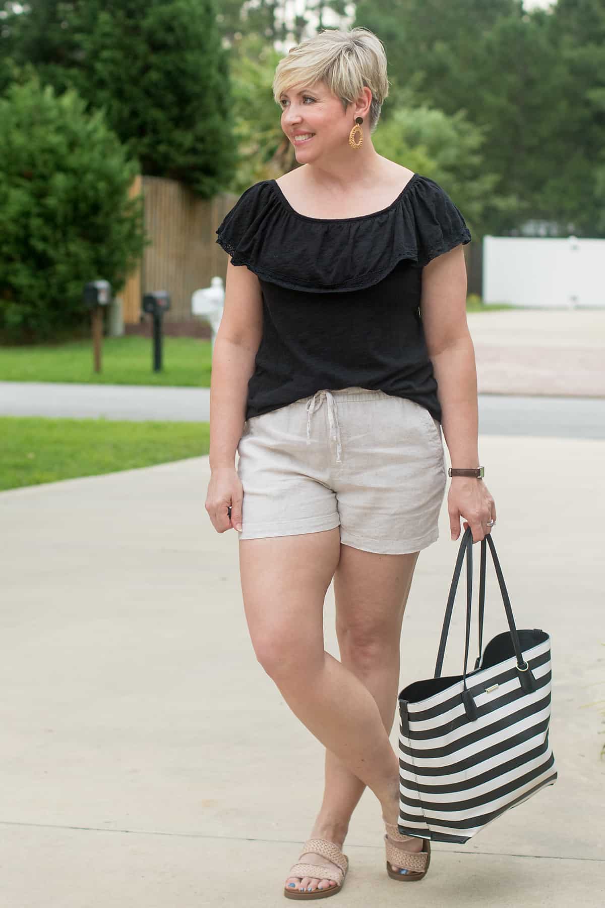 womens summer outfit with rattan earrings