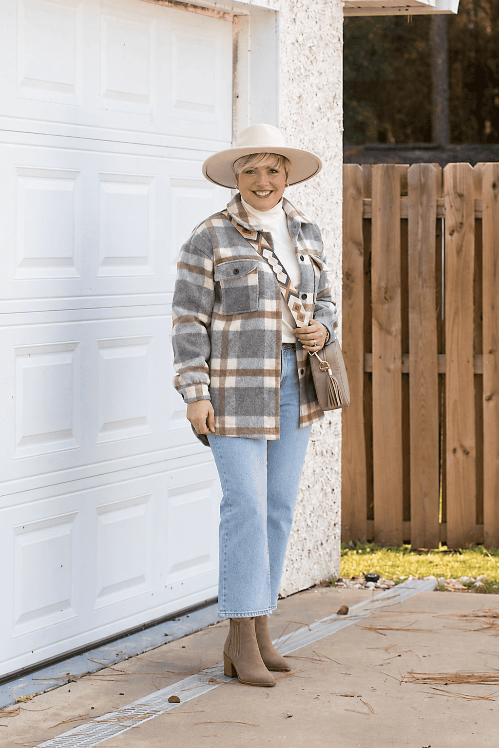 plaid shacket and light wash jeans fall outfit