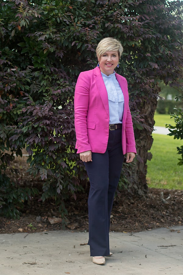 pink blazer with blue pants