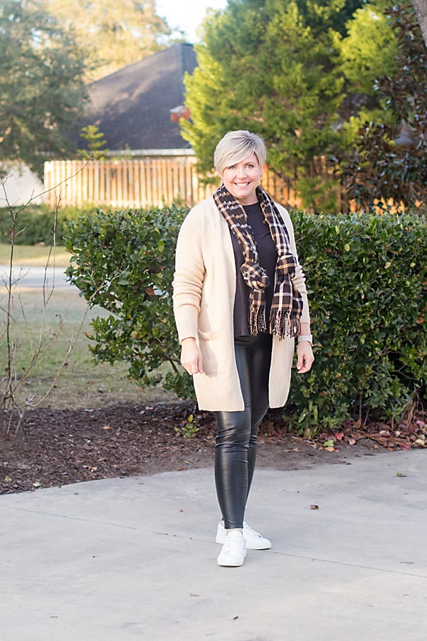 faux leather leggings with cardigan and white sneakers