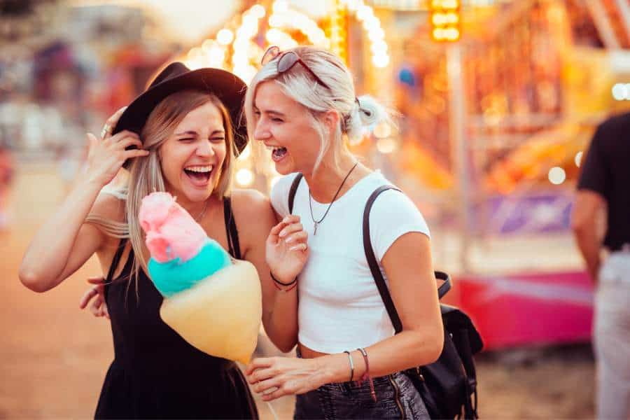 women having fun at an amusement park