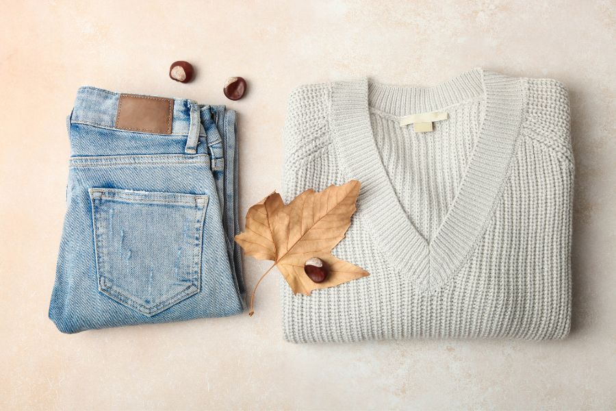 sweater and jeans flatlay