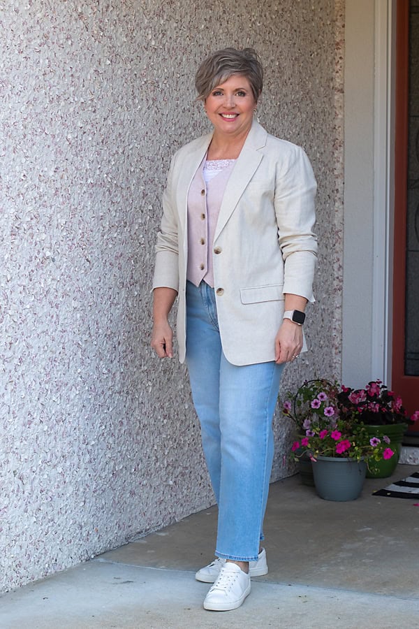 neutral blazer with jeans and vest