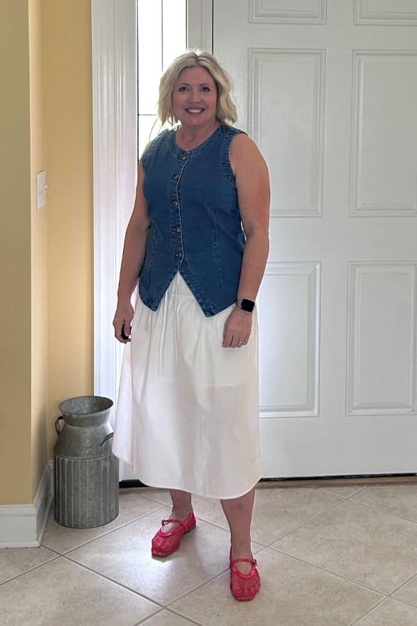 denim vest and red mesh flats outfit
