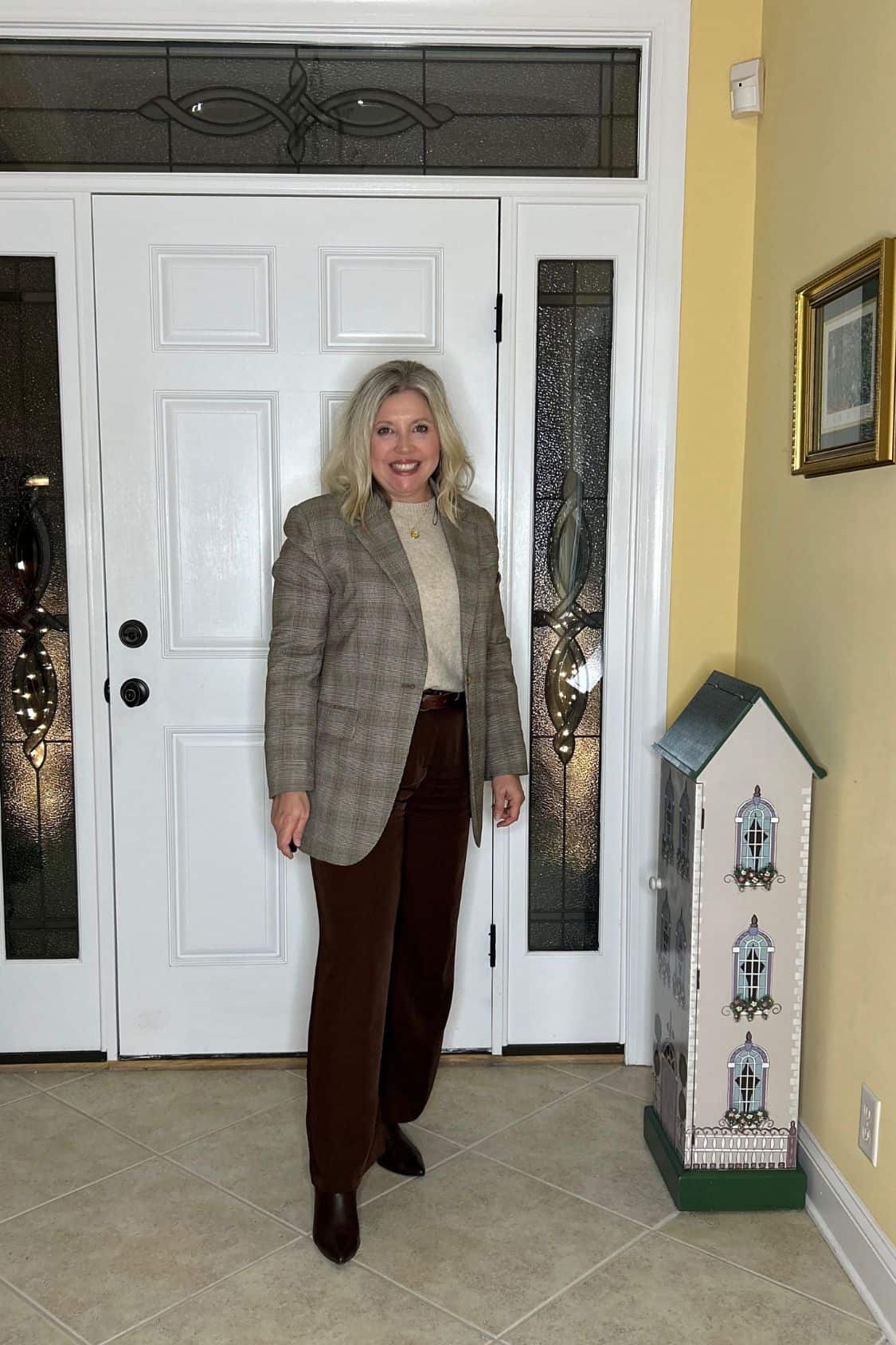 winter work outfit with brown plaid blazer, sweater and brown trousers
