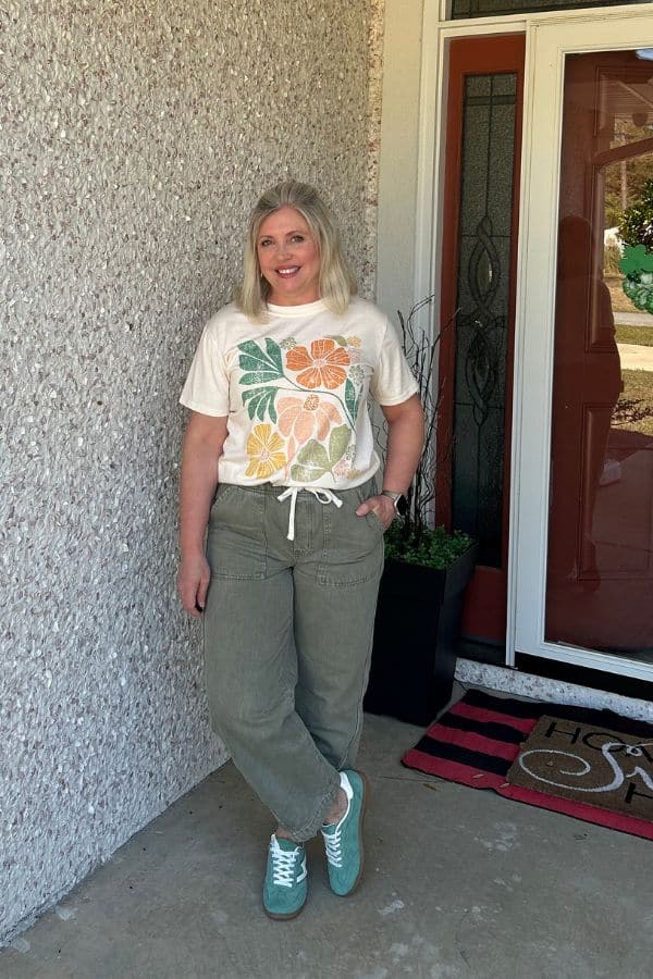 spring outfit with barrel leg jeans and colored sneakers
